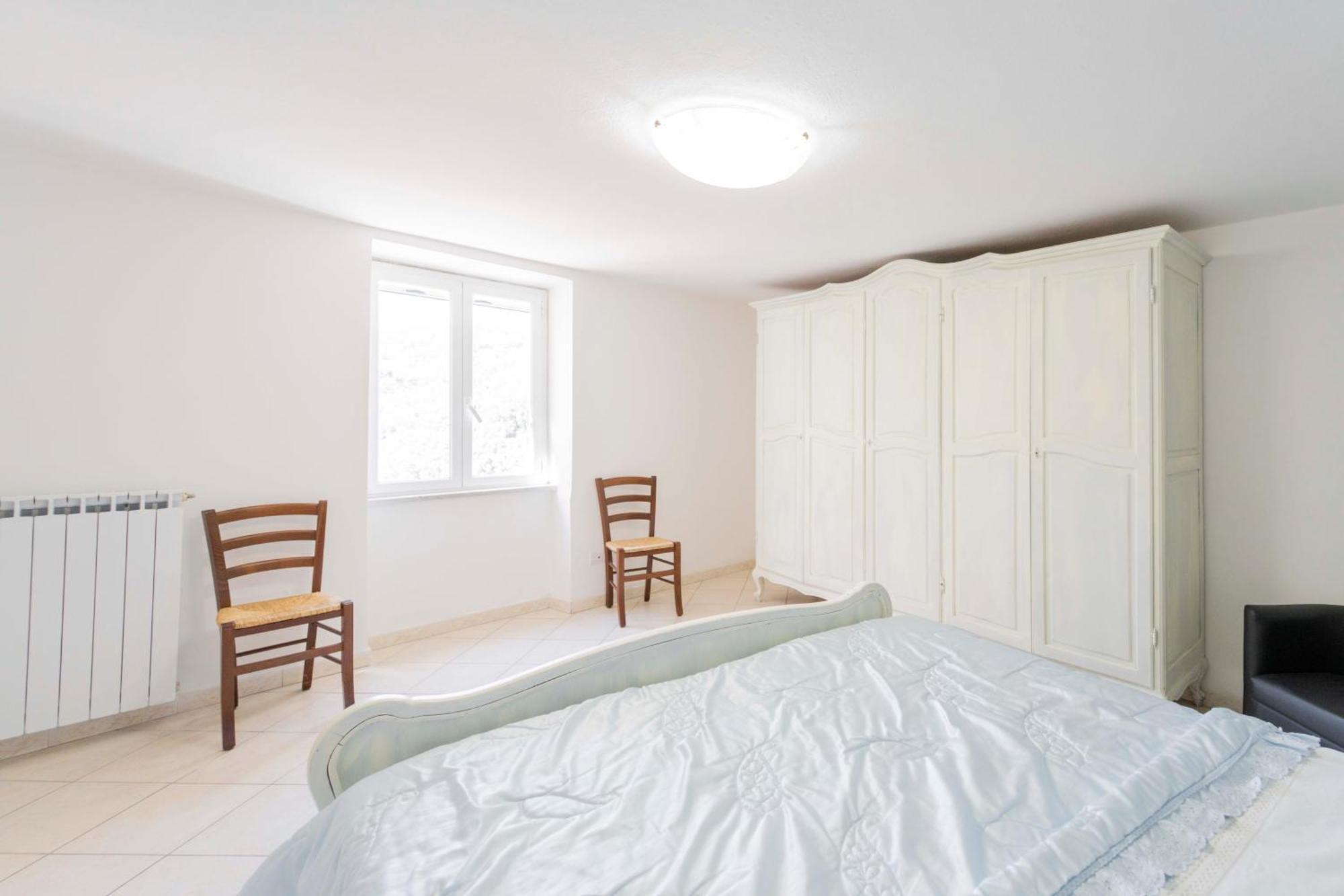 Casa Vacanza Il Portico Монелья Номер фото